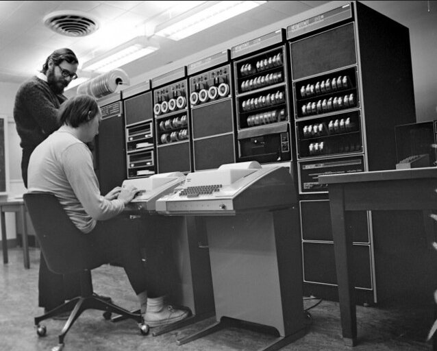 Dennis Ritchie and Ken Thompson at a PDP-11